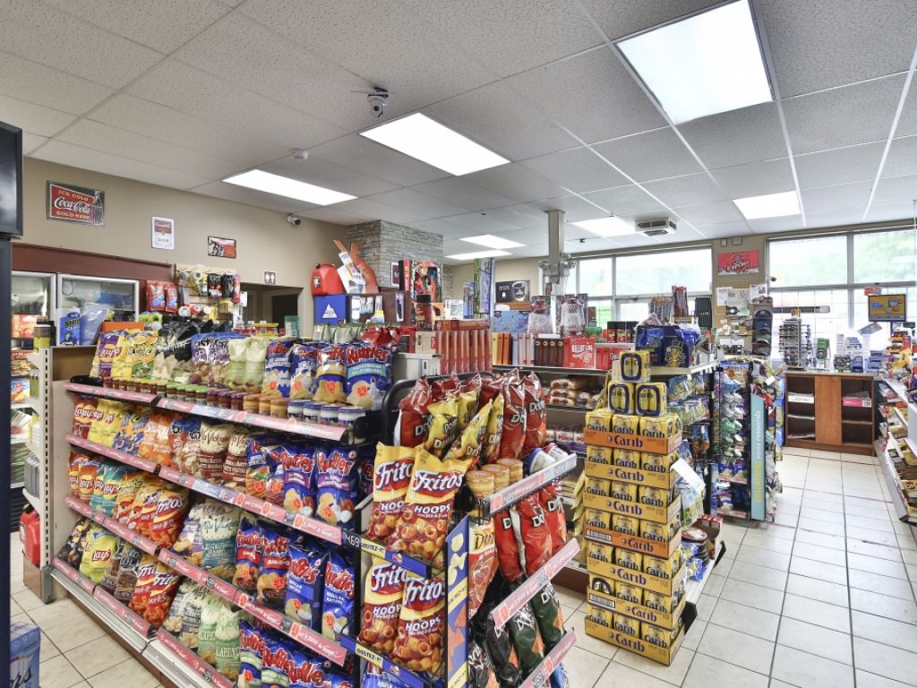 Complete convenience store with gas station and much more!